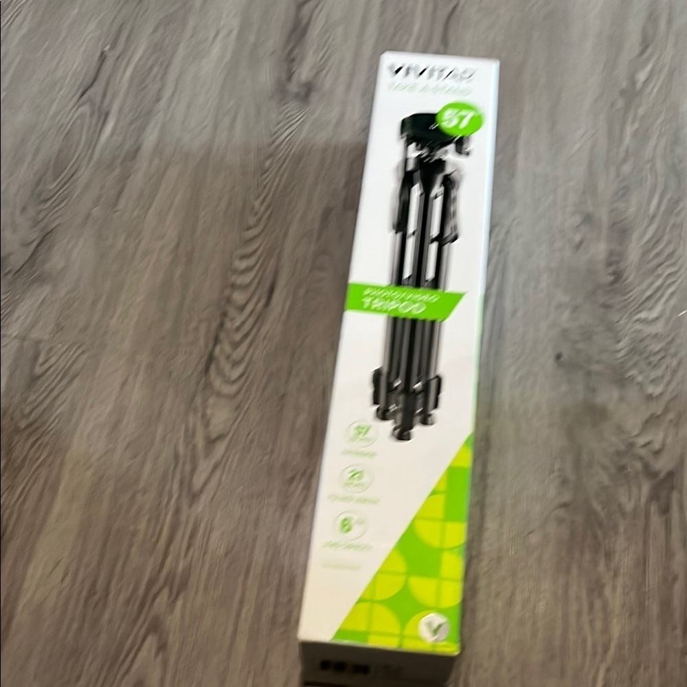 Green and Black Tripod